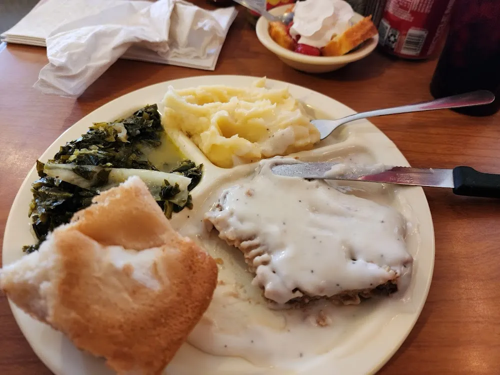 Country Fried Steak Collard Greens Mashed Potatoes and Gravy Strawberry Shortcake